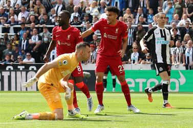 NEWCASTLE UPON TYNE, ENGLAND - APRIL 30: Naby Keita celebrates with teammates Luis Diaz and Andrew Robertson of Liverpool after scoring the only goal during the Premier League match between Newcastle United and Liverpool at St. James Park on April 30, 2022 in Newcastle upon Tyne, England. (Photo by Ian MacNicol / Getty Images)