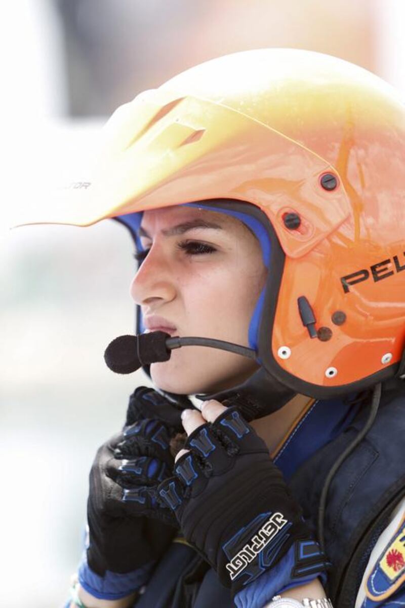 Fatima Al Zaabi of Raheeb adjusts her helmet ahead of the practice session during day three of the Fujairah Grand Prix. Darren Arthur / Getty Images