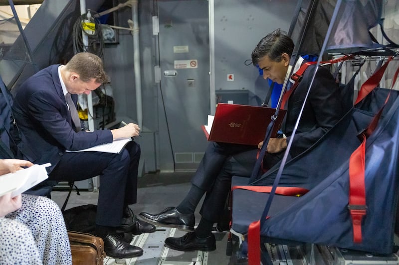 Mr Sunak was pictured working on the plane on his way to Israel. Photo: No 10 Downing Street