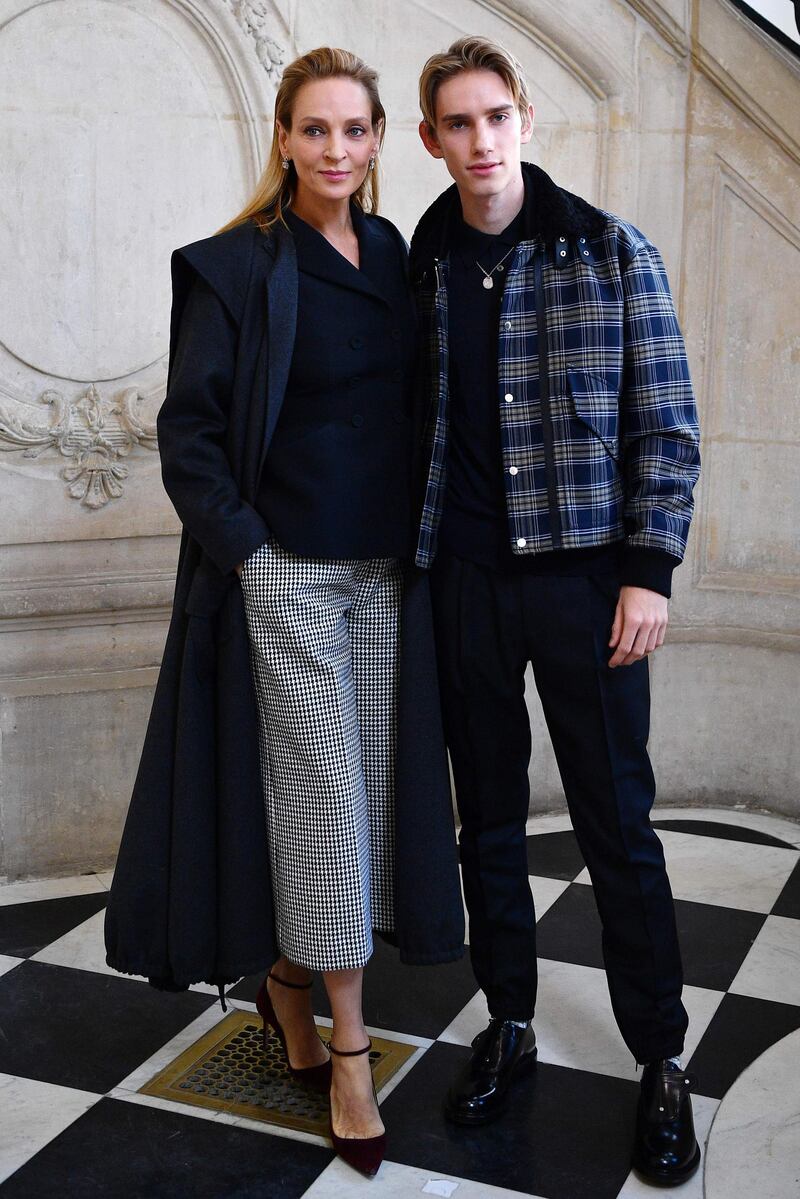 US actress Uma Thurman, left, poses with her son Levon Roan Thurman-Hawke ahead of the Dior Women's Spring-Summer 2020/2021 Haute Couture show. AFP
