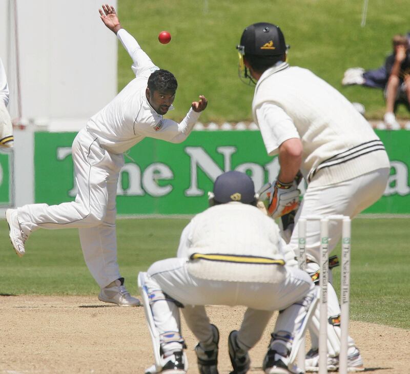 WELLINGTON, NEW ZEALAND - DECEMBER 18: Muttiah Muralitharan of Sri Lanka in action against James Franklin of New Zealand during day four of the second test match between New Zealand and Sri Lanka at the Basin Reserve December 18, 2006 in Wellington, New Zealand.     (Photo by Marty Melville/Getty Images)