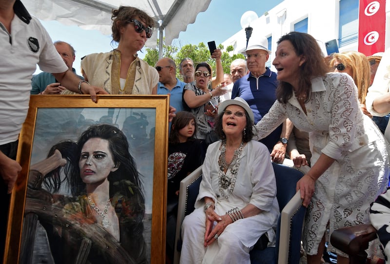 Cardinale, centre, spent her childhood in Tunisia before moving to Italy.