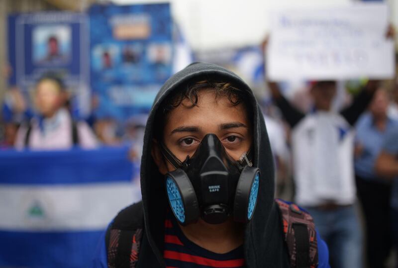A student marches in a demonstration demanding the resignation of Nicaraguan President Daniel Ortega. AFP Photo