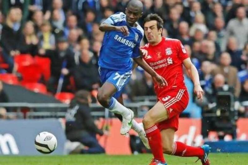 Chelsea's Ramires (L) is challenged by Liverpool's Jose Enrique during their FA Cup final soccer match at Wembley Stadium in London May 5, 2012. REUTERS/Phil Noble (BRITAIN - Tags: SPORT SOCCER) *** Local Caption *** WEM11_SOCCER-ENGLAN_0505_11.JPG