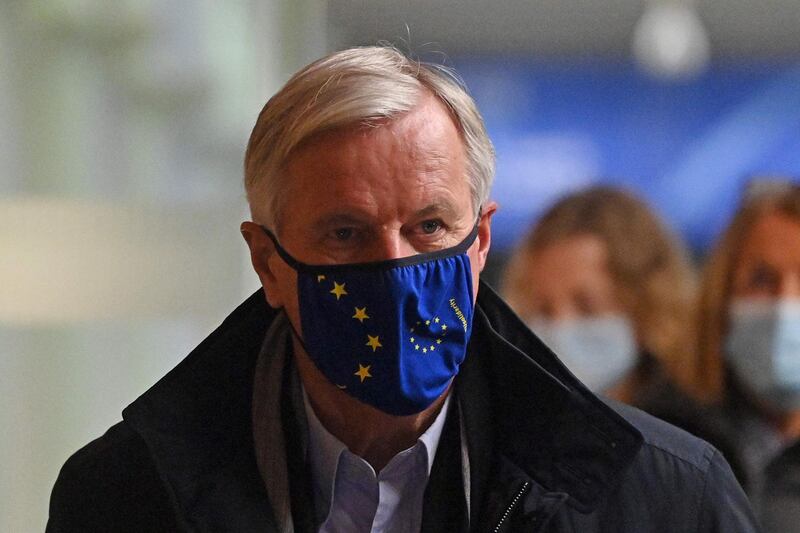 EU chief negotiator Michel Barnier wearing a mask because of the coronavirus pandemic arrives at St Pancras Station in London as work continues on a trade deal between the EU and the UK.  AFP