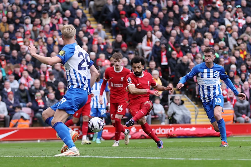 Mohamed Salah of Liverpool scores his team's second goal against Brighton. Getty Images