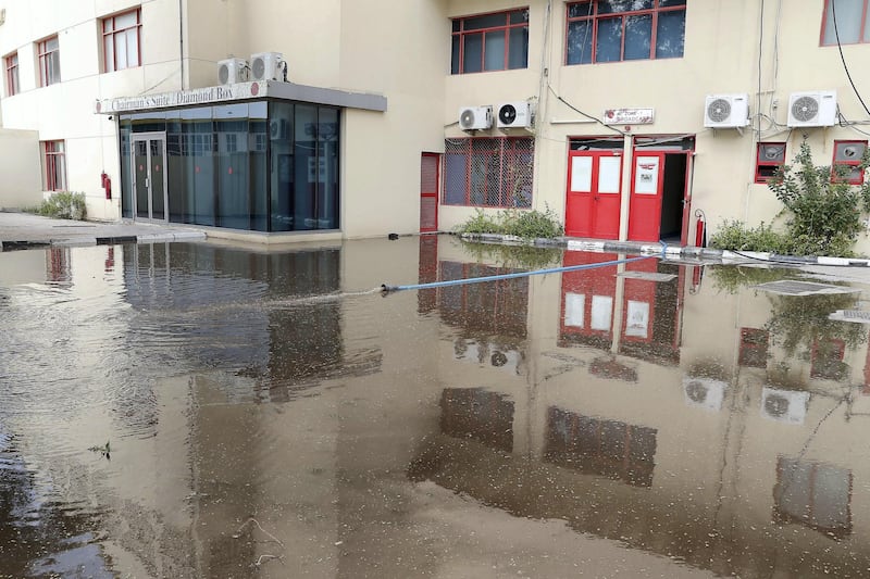 SHARJAH, UNITED ARAB EMIRATES , Dec 11– 2019 :- Ground staff pumping out the rain water from the cricket ground at the Sharjah Cricket Stadium in Sharjah. World Cup League 2 match between UAE vs Scotland abandoned due to wet ground. ( Pawan Singh / The National )  For News/Sports/Instagram/Online. Story by Paul