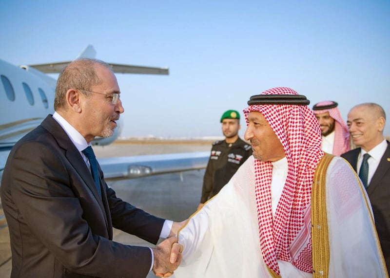 Mr Al Khuraiji welcomes Jordan's Foreign Minister Ayman Safadi. EPA 