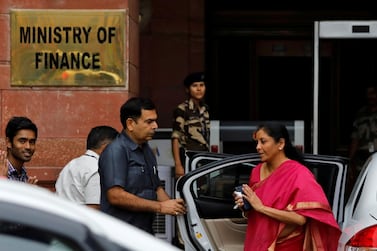 India's finance minister Nirmala Sitharaman outside her office before presenting the federal budget in July. On Saturday, a Dh5.17bn funding window for affordable home projects was one of a number of measures announced as part of a stimulus package. Reuters