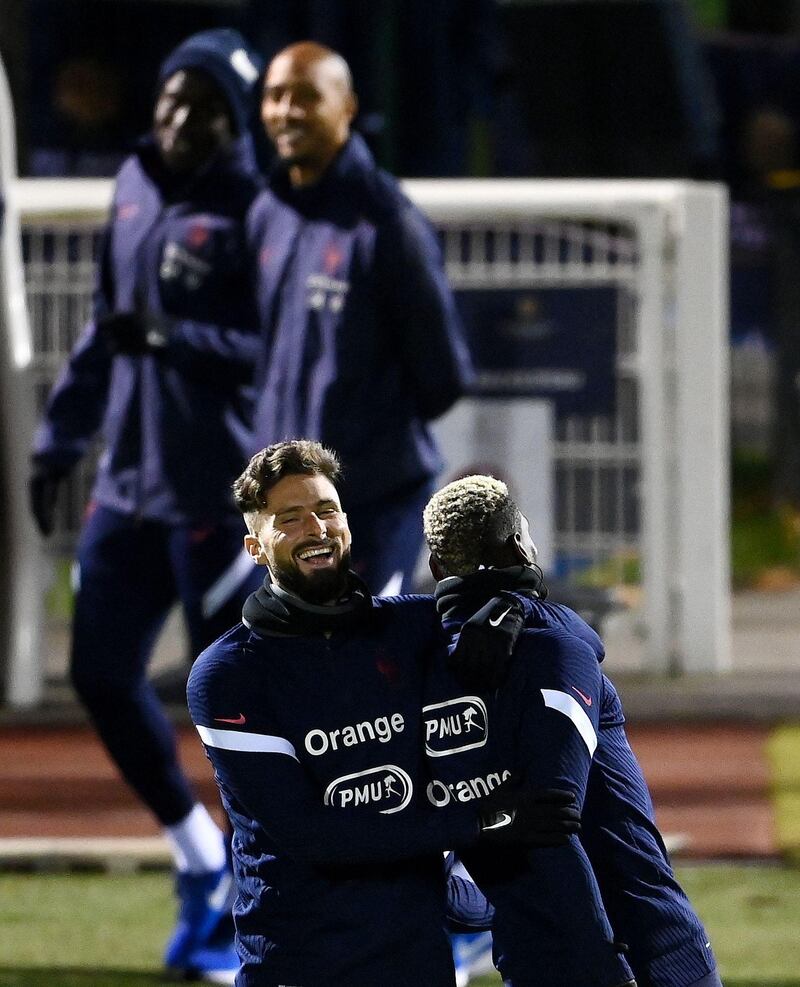 France's Olivier Giroud shares a joke  with Paul Pogba. AFP