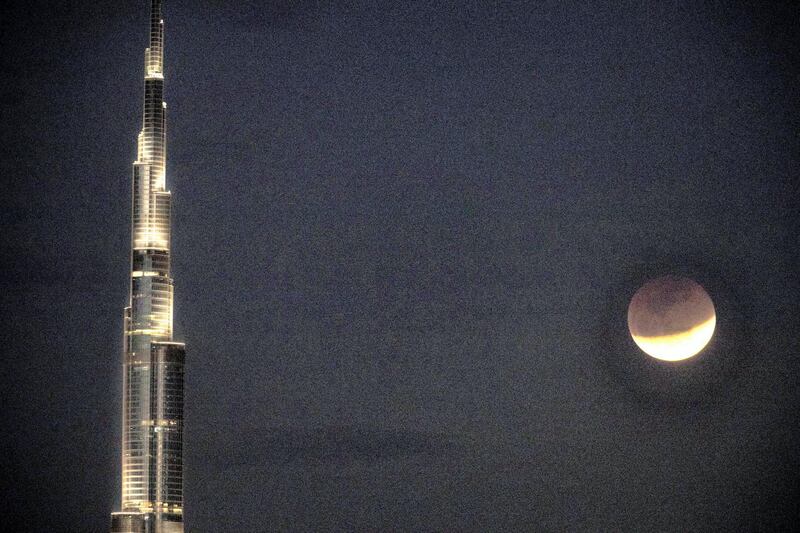 DUBAI, UNITED ARAB EMIRATES - Jan 31, 2018.Lunar eclipse by Burj Khalifa in Dubai.(Photo by Reem Mohammed/The National)Reporter: 