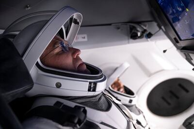 Stephen Bowen inside a Dragon mock-up crew vehicle, taking part in training at the SpaceX base in Hawthorne, California. Photo: SpaceX