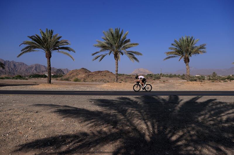 An athlete competes in the bike leg during the Hatta Grit + Tonic Triathlon in the UAE  on Friday, November 13. Getty