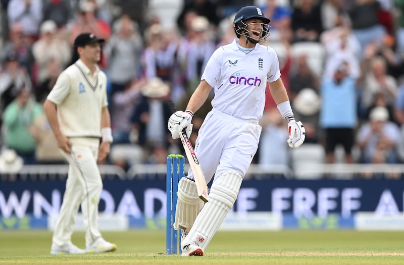 England batsman Joe Root smiles after reaching his century on day three of the second Test against New Zealand at Trent Bridge on Sunday, June 12, 2022. Getty