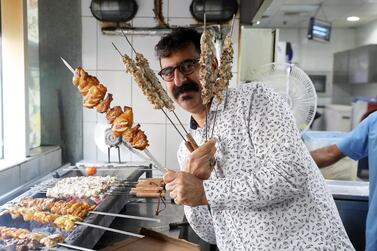 Al Ustad Special Kebab owner Majeed Al Ansari says his restaurant has two golden rules: ‘Serve good food and respect the people. Pawan Singh / The National