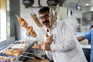 Al Ustad Special Kebab owner Majeed Al Ansari says his restaurant has two golden rules: ‘Serve good food and respect the people. Pawan Singh / The National