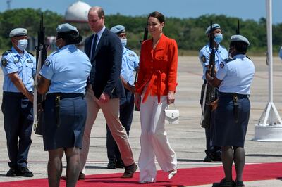 The Duke and Duchess of Cambridge board their plane after their trip to Belize on March 22, 2022. AFP 