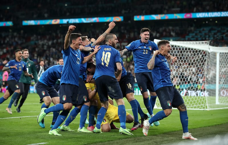 Italy players celebrate winning the penalty shoot-out against England in the final of Euro 2020 at Wembley Stadium on July 21, 2021. PA