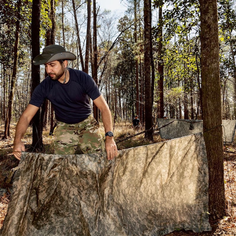 Mohammed Al Mulla, a former Dubai Police helicopter pilot, is progressing in his training at Nasa to become an astronaut. He recently completed survival training in a remote location in Alabama with nine of his Nasa colleagues. Here, he is seen building a shelter in the wilderness. All photos: Mr Al Mulla / Twitter