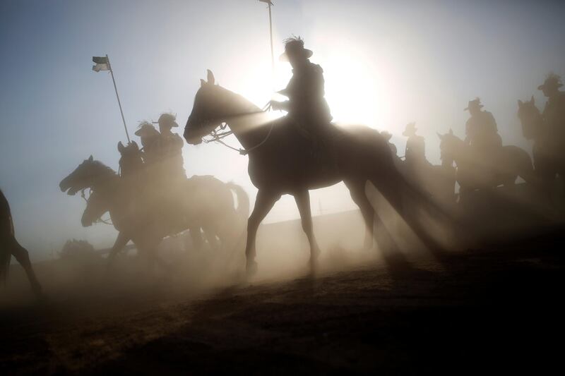Descendants of soldiers from the Australian and New Zealand Army Corps (ANZAC) take part in a dress rehearsal of a re-enactment of the famous World War One cavalry charge known as 'Battle of Beersheba' in Israel. Amir Cohen / Reuters