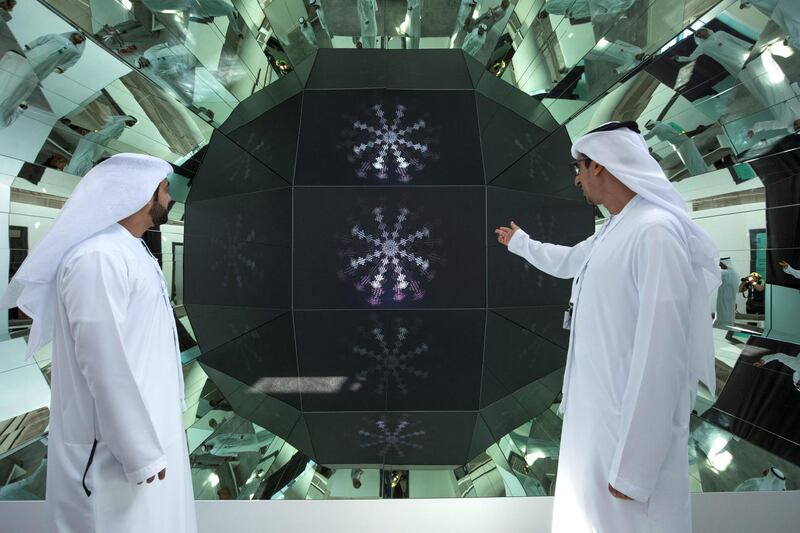 ABU DHABI, UNITED ARAB EMIRATES - Attendees looking at an art installation on display at the Al Burda Festival, Shaping the Future of Islamic Art and Culture at Warehouse 421, Abu Dhabi.  Leslie Pableo for The National for Melissa Gronlund���s story