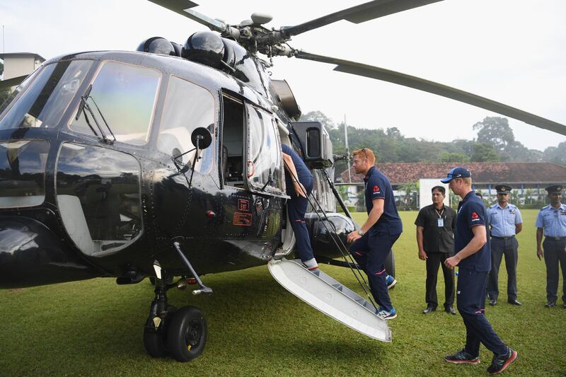 England batsman Jonny Bairstow boards a military helicopter on the way to the England cricket team's visit to a de-mining event held by MAG. Getty Images