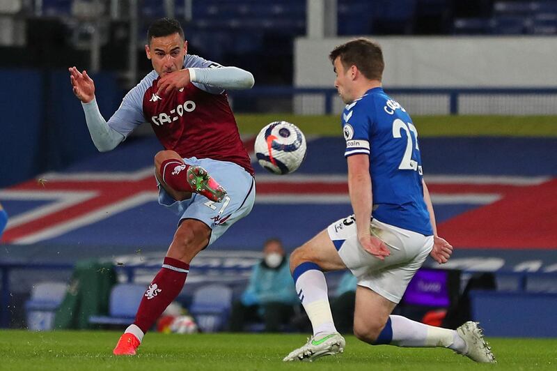 Aston Villa's Dutch striker Anwar El Ghazi (L) shoots past Everton's Irish defender Seamus Coleman (R) to score their second goal during the English Premier League football match between Everton and Aston Villa at Goodison Park in Liverpool, north west England on May 1, 2021. RESTRICTED TO EDITORIAL USE. No use with unauthorized audio, video, data, fixture lists, club/league logos or 'live' services. Online in-match use limited to 120 images. An additional 40 images may be used in extra time. No video emulation. Social media in-match use limited to 120 images. An additional 40 images may be used in extra time. No use in betting publications, games or single club/league/player publications.
 / AFP / POOL / Peter Byrne / RESTRICTED TO EDITORIAL USE. No use with unauthorized audio, video, data, fixture lists, club/league logos or 'live' services. Online in-match use limited to 120 images. An additional 40 images may be used in extra time. No video emulation. Social media in-match use limited to 120 images. An additional 40 images may be used in extra time. No use in betting publications, games or single club/league/player publications.
