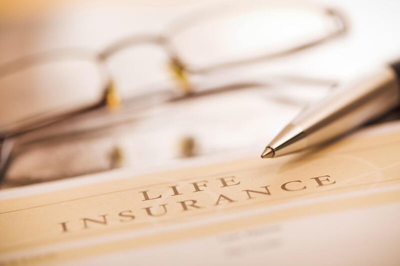 "Document entitled life insurance, a pen and glasses on a desk. Close up image. This is an exclusive image and it can only be found in iStockphoto.  ++Note: The document title is designed by me ++"