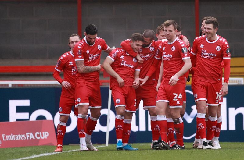 Crawley Town' players celebrate. Reuters