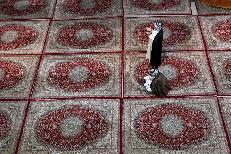 A man prays during the month of Ramadan at Al Qasim Mosque in Hilla, Iraq. Reuters