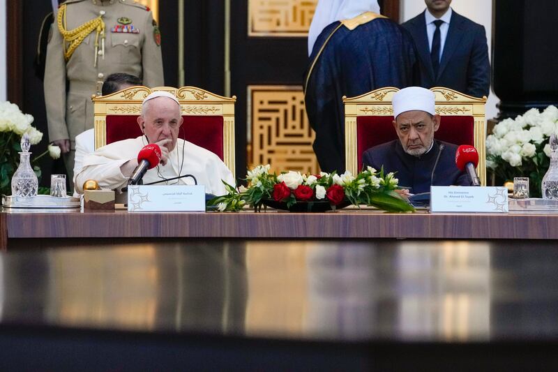 Pope Francis and Dr Ahmed El Tayeb, Grand Imam of Al Azhar, attend a meeting with council members at the mosque in Sakhir Palace. AP