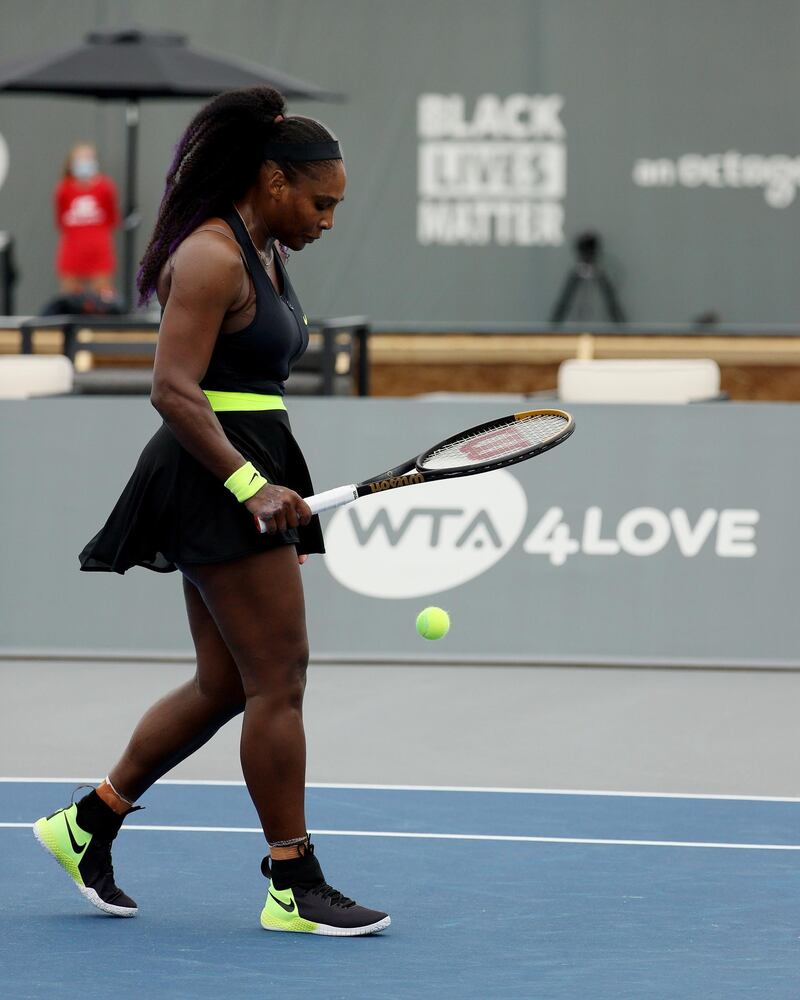 Serena Williams walks across the court. AFP