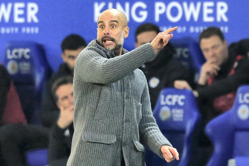Manchester City's Spanish manager Pep Guardiola gestures on the touchline during the English Premier League football match between Leicester City and Manchester City at King Power Stadium in Leicester, central England on December 26, 2018. - Leicester won the game 2-1. (Photo by Lindsey PARNABY / AFP) / RESTRICTED TO EDITORIAL USE. No use with unauthorized audio, video, data, fixture lists, club/league logos or 'live' services. Online in-match use limited to 120 images. An additional 40 images may be used in extra time. No video emulation. Social media in-match use limited to 120 images. An additional 40 images may be used in extra time. No use in betting publications, games or single club/league/player publications. / 
