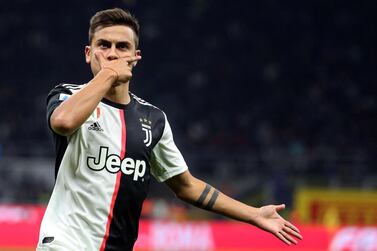epa08405676 (FILE) - Juventus' Paulo Dybala jubilates after scoring the 0-1 goal during the Italian serie A soccer match between FC Inter and Juventus FC at Giuseppe Meazza stadium in Milan, Italy, 6 October 2019 (re-issued on 06 May 2020). On 06 May 2020 Juventus FC announced that Paulo Dybala 'performed, as per protocol, a double check with diagnostic tests (swabs) for Coronavirus-Covid 19, which came back with negative results. The player has, therefore, recovered and will no longer be subjected to the home isolation regime'. EPA/MATTEO BAZZI *** Local Caption *** 55528853