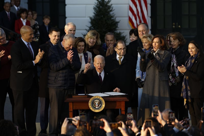 US President Joe Biden signs the Respect for Marriage Act during a ceremony on the South Lawn of the White House in Washington. Bloomberg  