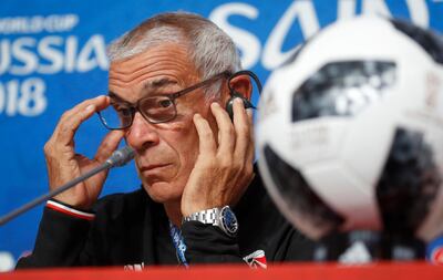 Egypt head coach Hector Cuper attends a news conference on the eve of the group A match between Russia and Egypt at the 2018 soccer World Cup in the St. Petersburg stadium in St. Petersburg, Russia, Monday, June 18, 2018. (AP Photo/Dmitri Lovetsky)