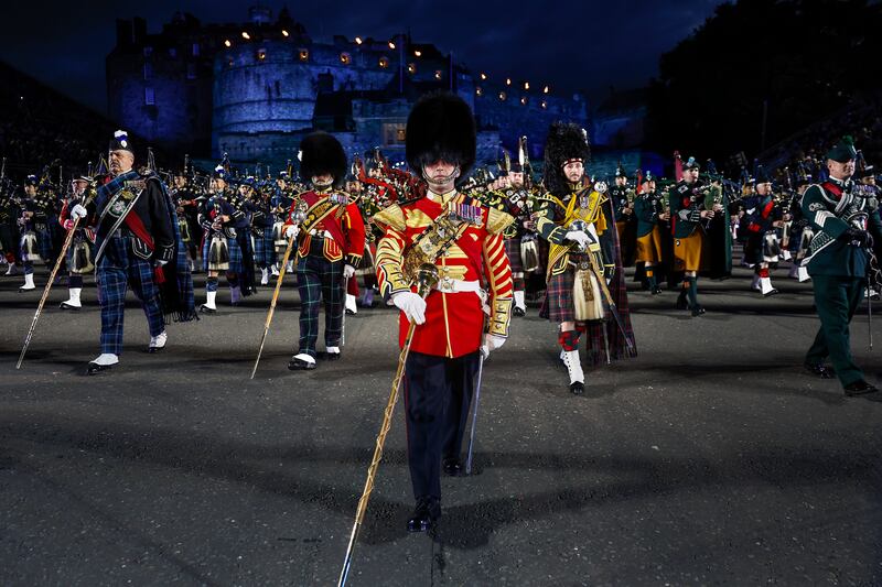 The massed pipes and drums during a working rehearsal for the first full run-through of the Royal Edinburgh Military Tattoo in Scotland. Getty Images