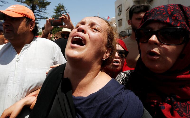 Monia mourns her son, Anis El Werghi, at his funeral in Tunis on July 9, 2018. The Tunisian security forces member was killed Sunday in an ambush in the country's north-west. Reuters