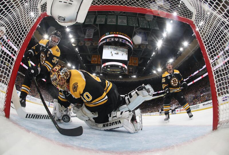 Boston Bruins defenseman Zdeno Chara (33) sweeps the puck out of the crease after it got behind goaltender Tuukka Rask (40) during the second period in game seven of the 2019 Stanley Cup Final against the St. Louis Blues at TD Garden. Pool Photo