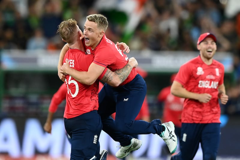 Ben Stokes and Sam Curran of England celebrate. Getty 