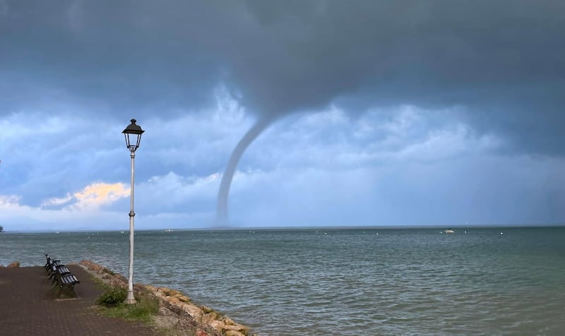 A tornado over the Veronese part of Lake Garda, northern Italy. Although such tornados occur mostly in tropical and subtropical areas they are also possible under certain weather conditions over larger lakes and standing waters in Europe and other parts of the globe.   EPA 