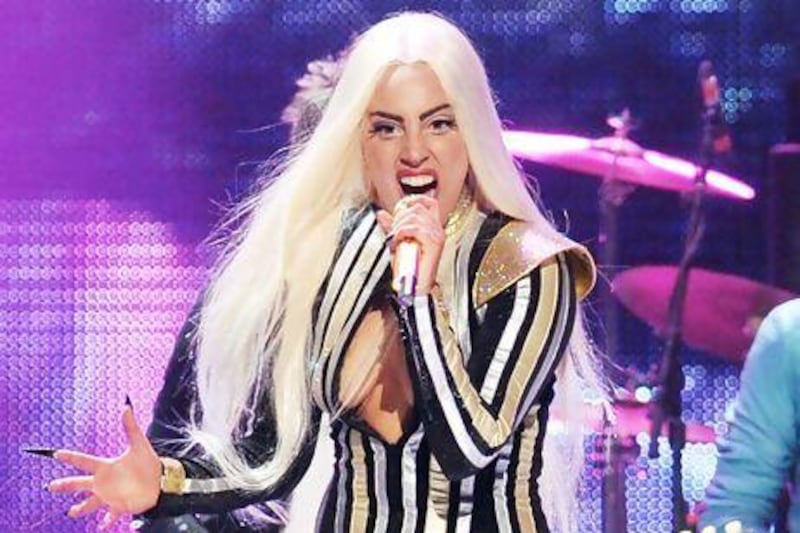 Lady Gaga is having to rest because of an injury. Evan Agostini / Invision / AP