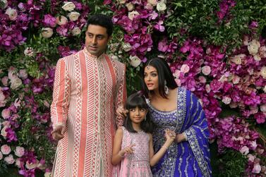 Abhishek Bachchan, Aishwarya Rai and their daughter, Aaradhya, in a photograph taken at the wedding of Akash Ambani, the son of Reliance Industries chairman Mukesh Ambani, in 2019. Reuters 