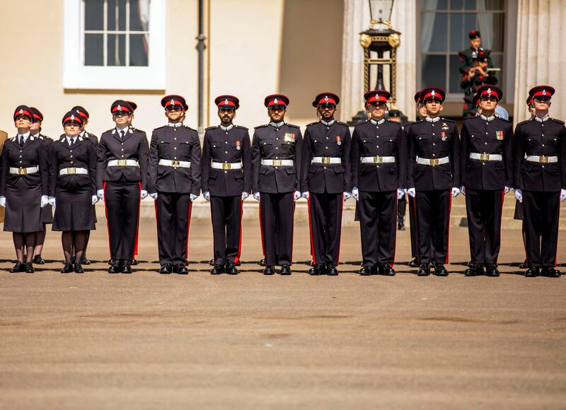 Sultan Haitham inspects the military graduates.