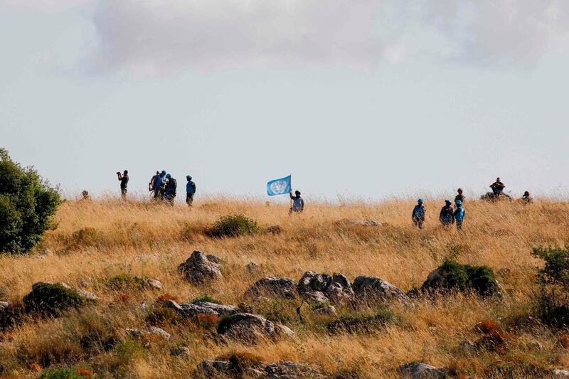 Near the northern Israeli kibbutz of Misgav Am, shows The Lebanese army and UNIFIL soldiers watch the Israeli-Lebanon border. AFP