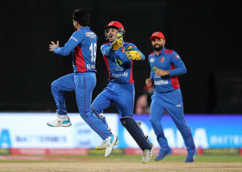 Pakistan's Abdullah Shafique is bowled by Afghanistan's Rashid Khan. 