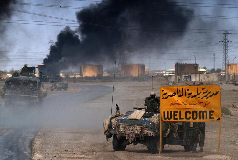 US Marines enter the southern Iraqi city of Nasiriyah as they move towards the capital Baghdad in March 2003. Even before the invasion spiralled out of control, US troops were encountering fierce resistance (AFP/Eric Feferberg)