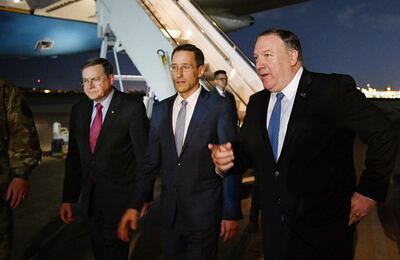 Secretary of State Mike Pompeo, right walks with Acting Assistant Secretary for Near Eastern Affairs at the State Department David Satterfield, left, and Charge D'affaires at the U.S. Embassy in Baghdad Joey Hood upon arrival in Baghdad, on Tuesday, May 7, 2019.  (Mandel Ngan/Pool Photo via AP)
