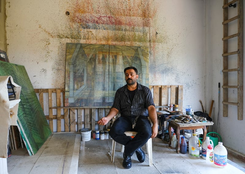 Lebanese fine artist and painter Paul Merhy, attends an interview with Reuters at his studio in Thoum, Lebanon July 1, 2022.  REUTERS / Emilie Madi