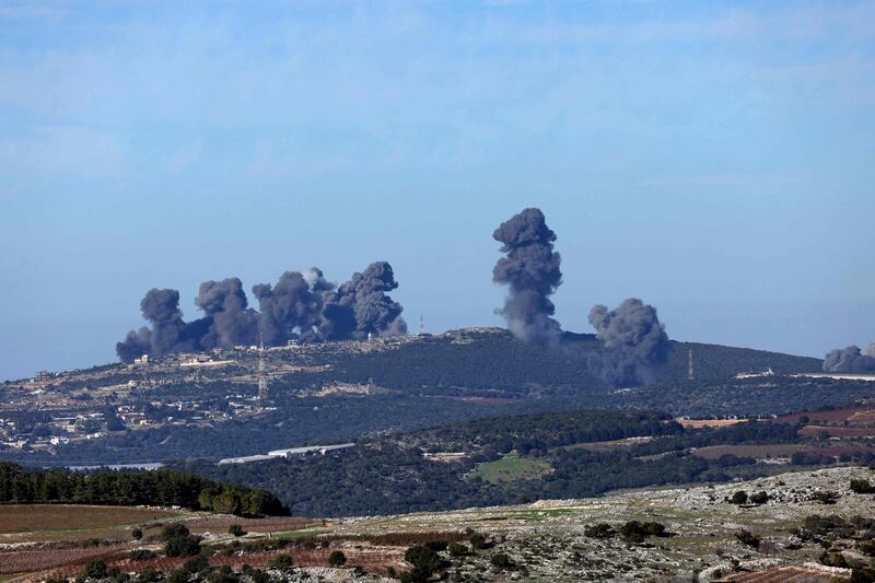 From northern Israel along the border with Lebanon, Israeli ordnance falls on hills close to the town of Marwahin in southern Lebanon on December 16, 2023. AFP